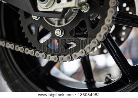 Modern motorcycle drive chain closeup. Shallow dof