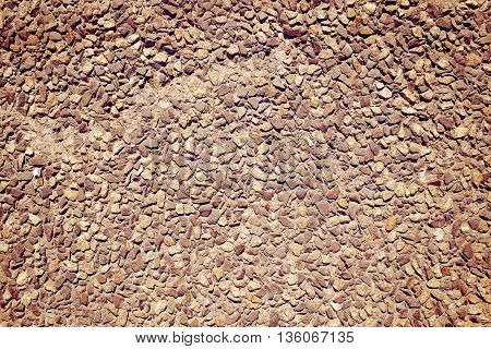 Cobblestone paved wall textured background for your use