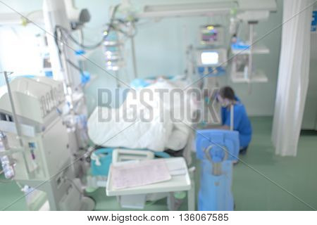 Medical doctor working with patient unfocused background
