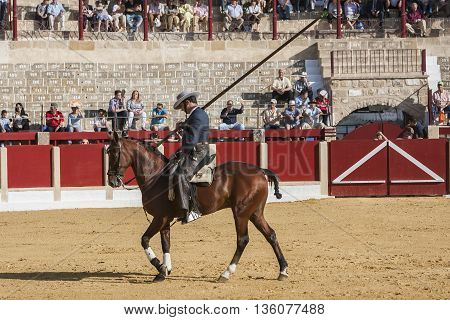 Ubeda SPAIN - September 29 2011: Alvaro Montes bullfighter on horseback spanish witch garrocha (blunt lance used on ranches) Ubeda Jaen province Andalusia Spain