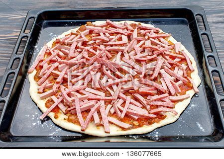 The preliminary stages of the pizza. Ingredients for cooking