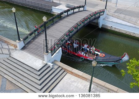 Aveiro, Portugal - 17 June 2016. Typical Moliceiro boat in the canals of the city of Aveiro in Portugal
