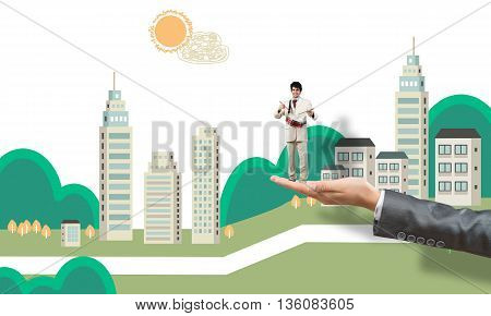 Big female palm holding small confident businessman playing drums