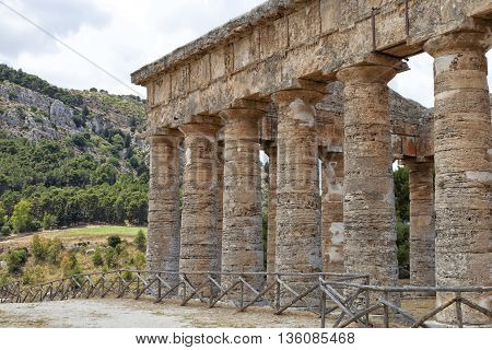 Doric pillars of ancient Greek temple in Segesta Sicily archeological site in the Mediterranean in countryside settings