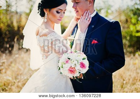 Close Up Portrait Of Young Stylish Weding Couple