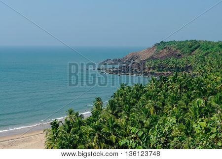 Sea view from hidden beach with palms near Agonda beach Goa state India