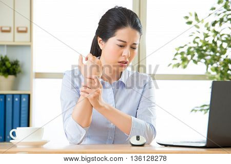 Young Asian Business Woman With Pain In Wrist