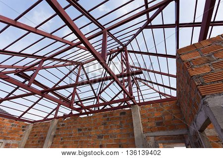 Structural Steel Beam On Roof And Brick Wall Of Building Residential Construction