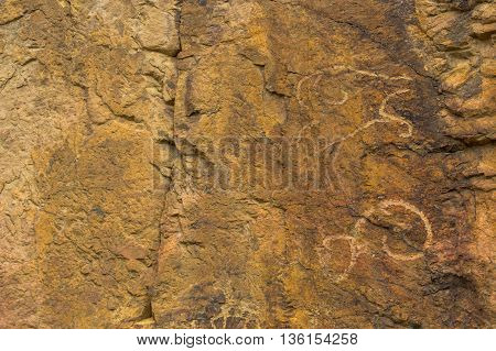 Petroglyphs on the stone in Tamgaly Kazakhstan