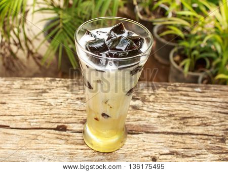 Soy milk grass Jelly on old wooden
