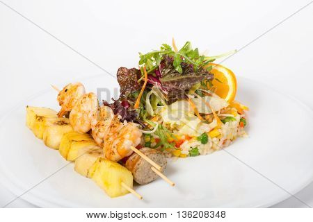 Tropical breakfast served with shrips skewer and rice