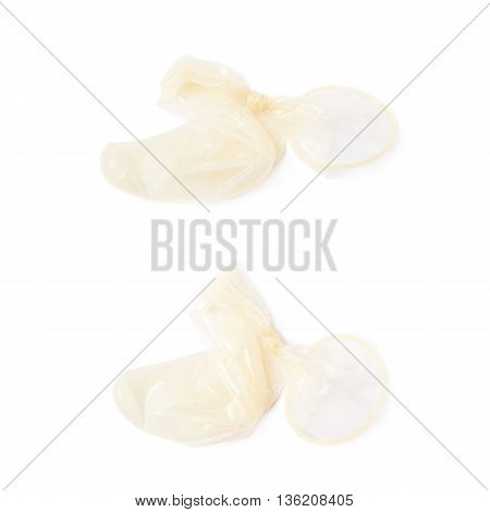 Used lated condom isolated over the white background, set of two different foreshortenings