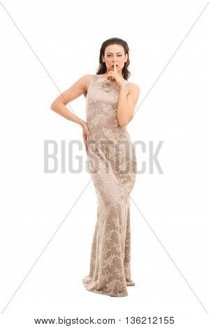 fashion model posing in studio, she wear evening dress