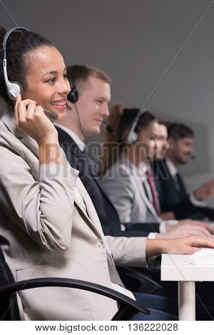 Call center employees during talking with a clients
