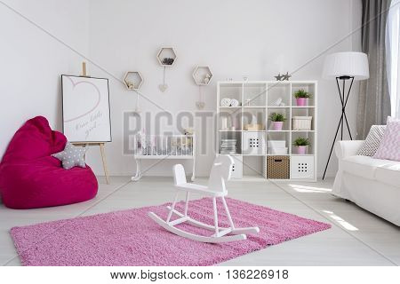 Friendly And Bright Little Girl's Room Interior