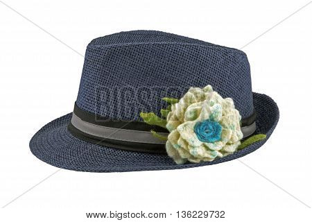 A hat with a flower on a white background