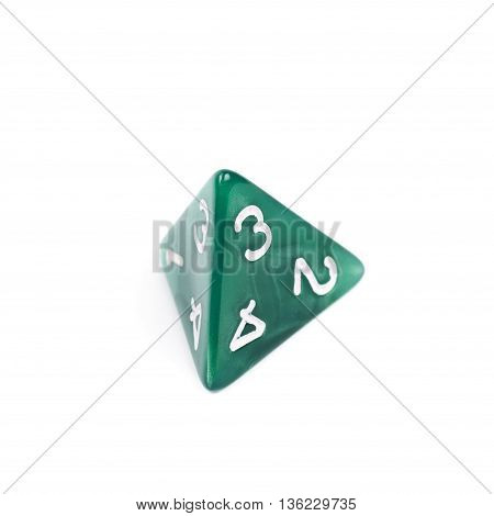 Green roleplaying polyhedral tetrahedron gaming plastic dice isolated over the white background