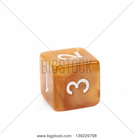 Roleplaying orange polyhedral gaming plastic dice cube isolated over the white background