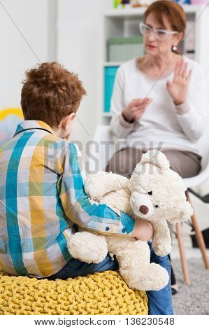 Teaching The Little Boy To Communicate With Outside World