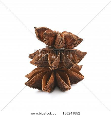 Pile of multiple Chinese star anise seeds, composition isolated over the white background