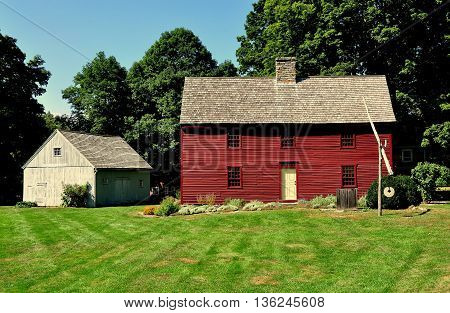 Woodbury Connecticut - September 15 2014: Circa 1680 Hurd House headquarters of the Old Woodbury Historical Society built entirely of wood with a central chimney