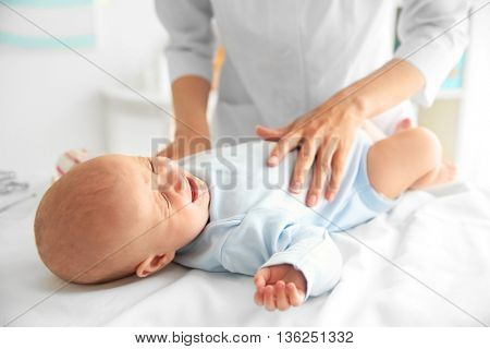 Doctor with little baby