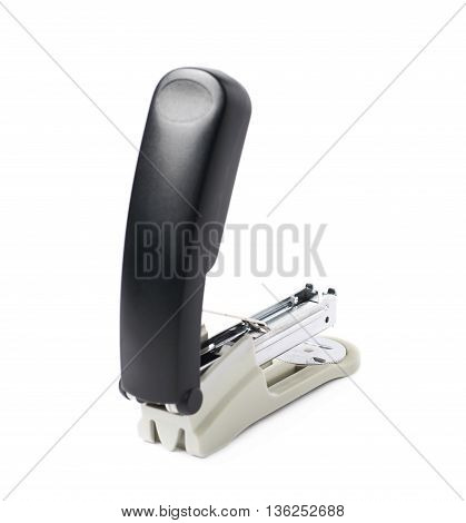 Black office stapler isolated over the white background