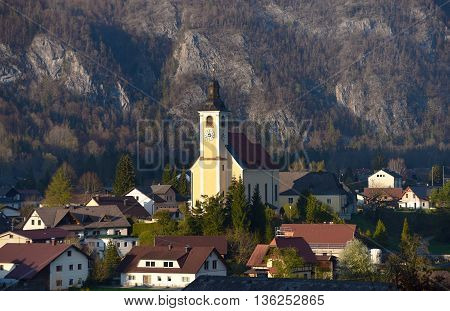 Sunny evening near town Grunau im Almtal with church