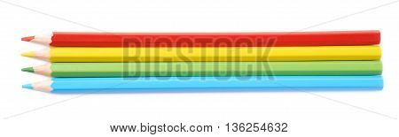 Four colorful drawing pencils composition isolated over the white background