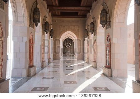 Muscat Oman - February 28 2016: Archway at Sultan Qaboos Grand Mosque in Muscat Oman. This is the largest and most decorated mosque in this mostly Muslim country.