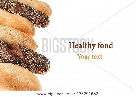 Baguette bread of different varieties on a white background. Rye wheat and whole grain bread. Isolated. Decorative frame of bread. Food background. Copy space.