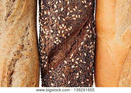 Bread of different varieties view from above. Rye wheat and whole grain bread. Macro. Texture. Food background.