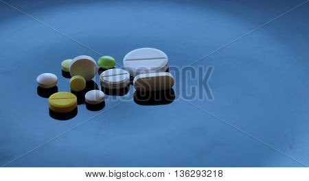 Colorful types of tablet pills detailed stock photo