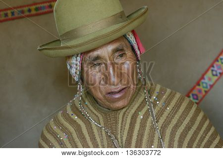 October 22 2-12 - Paru Paru, Peru: Portrait of a Native Peruvian man wearing typical andean robe, Paru Paru indigenous community, Andes Mountains.