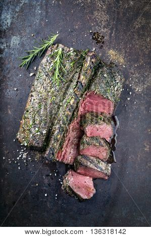 Saddle of Venison on old Metal Sheet