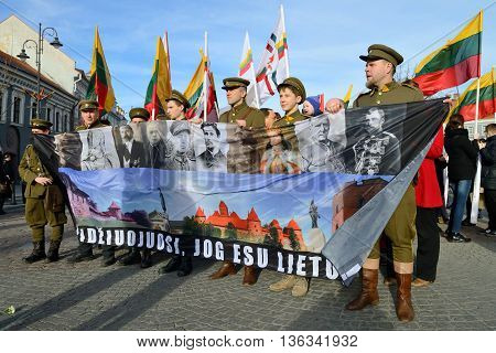 VILNIUS, LITHUANIA - MAR 11: Around one thousand people gathered with flags in a nationalist rally at Rotuses Square on Re-Establishment of Independence Day on March 11, 2014 in Vilnius, Lithuania