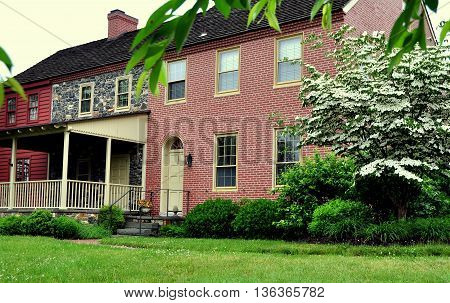 Kennett Square Pennsylvania - June 4 2015: The Woodlands built in 1828 and acquired by the Philiipis Family in 1890 houses a store selling fresh and dried mushrooms along with a gift shop