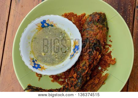 Deep fried catfish with turmeric  and Seafood sauce