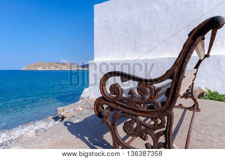 Spinalonga view from a bench in Plaka, Crete.