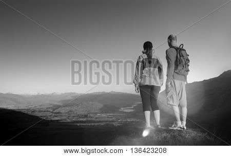 Adventurists Enjoying a Beautiful Sunrise Concept
