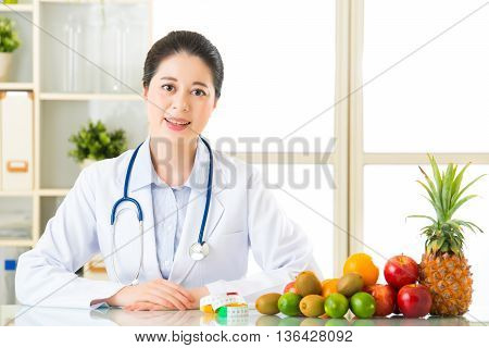 Young Asian Nutritionist Recommend Eating Fruits