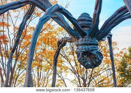 Tokyo, Japan - November 28 2015: Maman - A Spider Sculpture By Louise Bourgeois, Situated At The Bas