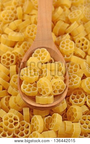 Uncooked Italian Pasta Rotelle In A Spoon