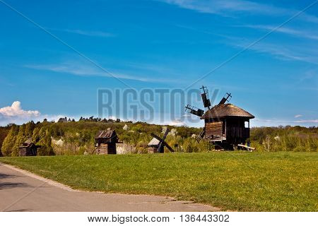Landscape with old windmills in the village Pirogovo, Ukraine Eastern Europe.