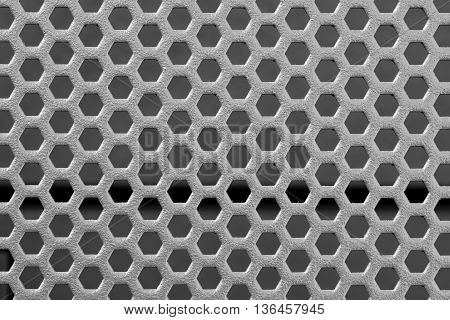 Black round punched mesh of highend server cover with blurry computer server module after lid