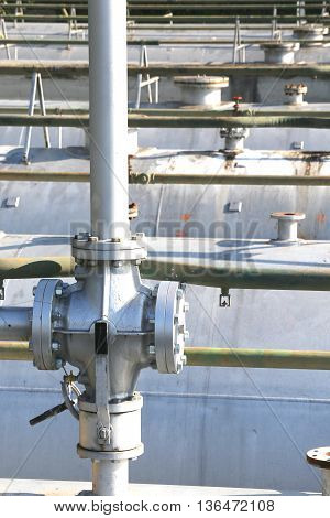 Big Ball Valve Above The Huge Gas Cylinder In The System Of Natu