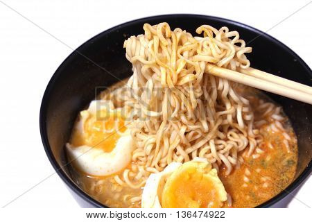 Hot and spicy instant noodle on isolated background