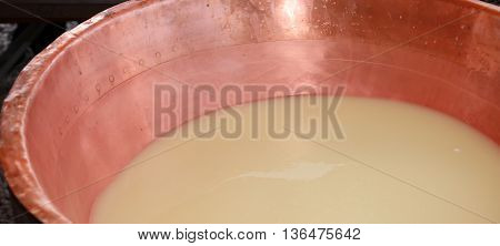 Copper Pot With The Milk And The Whey For The Production Of Chee
