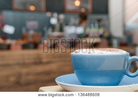 Coffee On A Table In A Busy Cafe