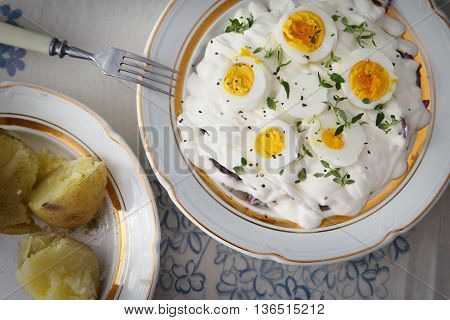 Herring salad with potatoes, eggs and onion